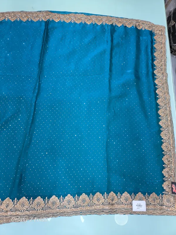 plain_saree_with_stone_and_zari_border
