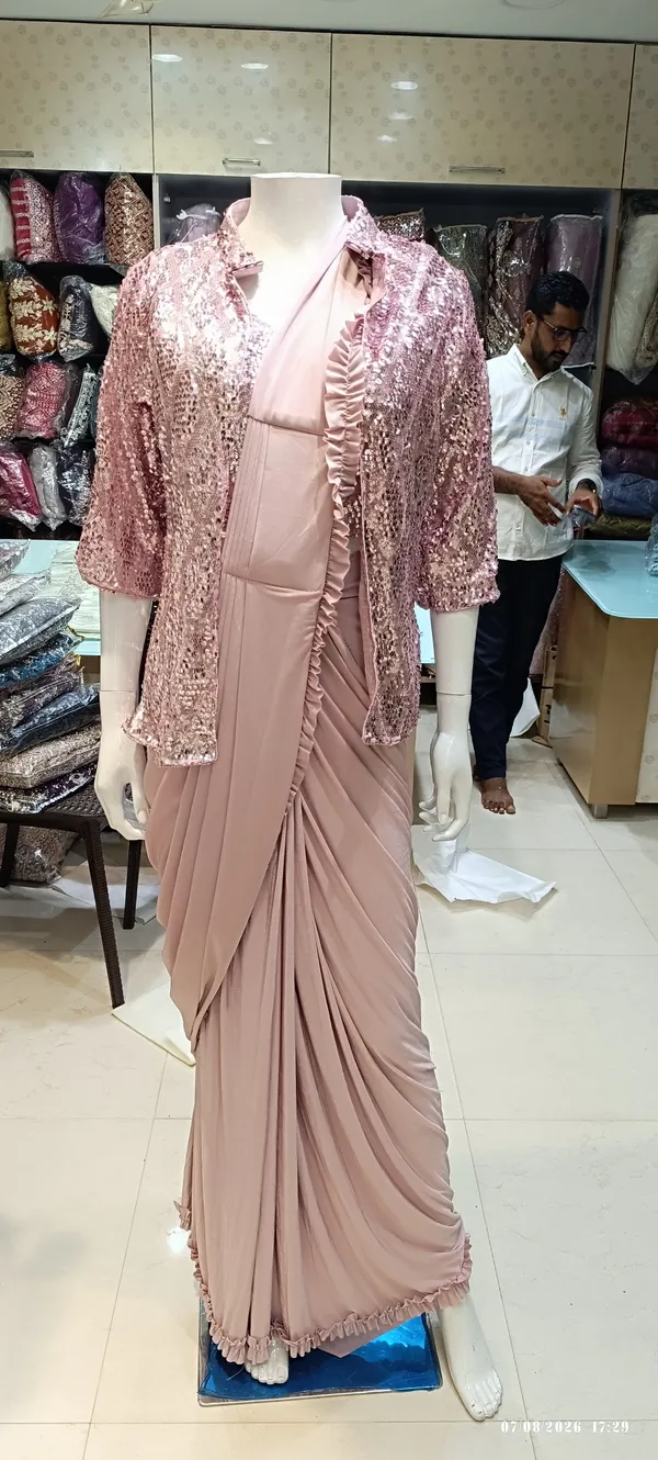 plain_blouse_with_sequience_jacket_with_work_frill_saree