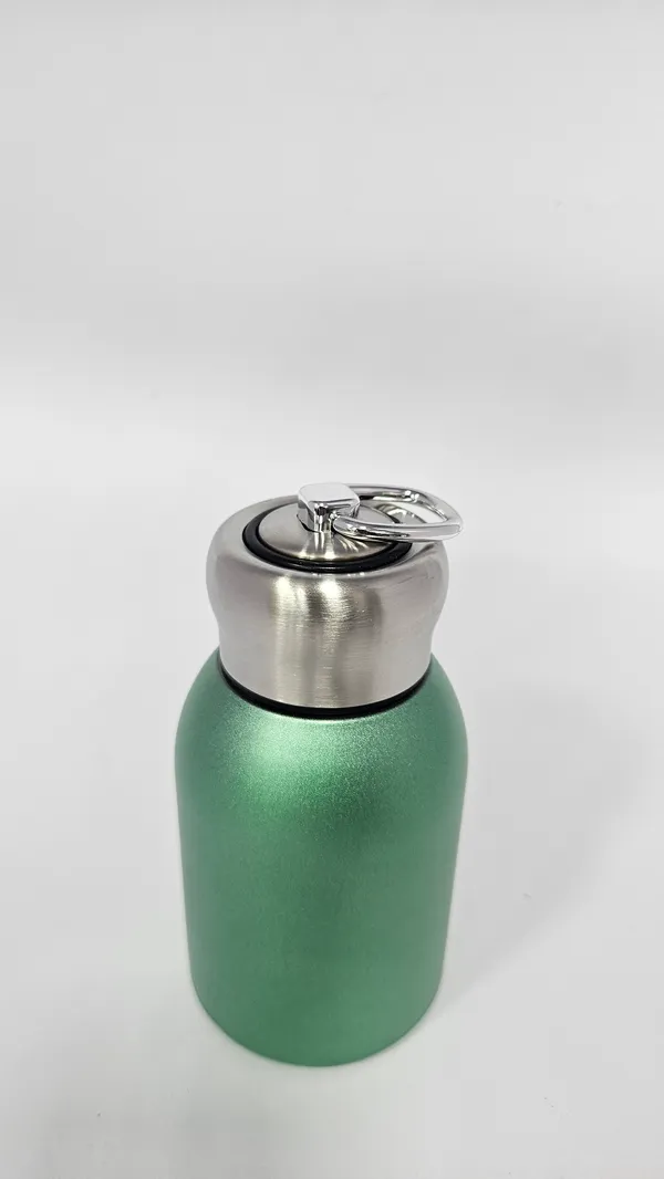 Green_Reusable_Water_Bottle_With_Silver_Lid