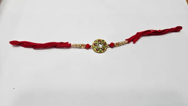 Red_Braided_Decorative_Rakhi_With_Ornate_Center