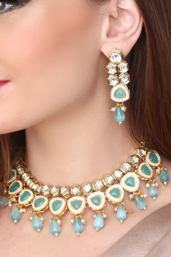 Gold_plated_kundan_necklace_set_with_blue_stones
