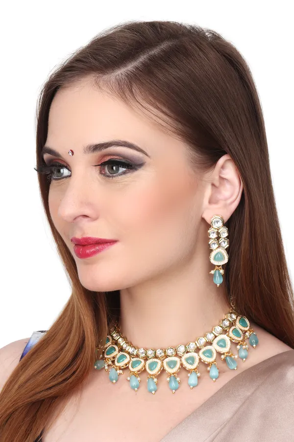 Gold_plated_kundan_necklace_set_with_blue_stones