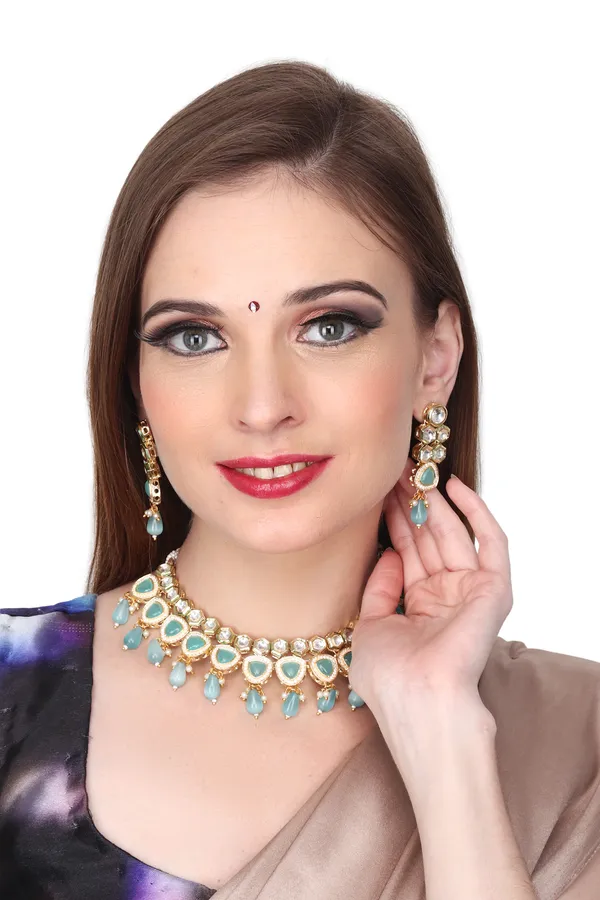 Gold_plated_kundan_necklace_set_with_blue_stones