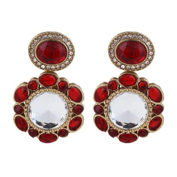 Statement_earrings_featuring_a_bold_circular_design_with_a_vintage_finish