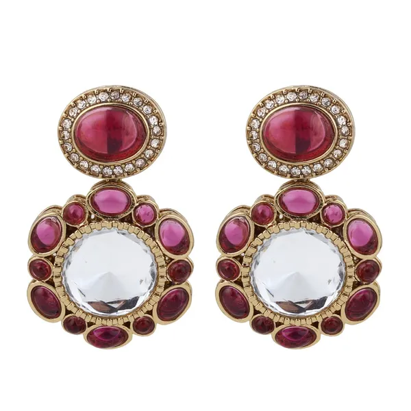 Statement_earrings_featuring_a_bold_circular_design_with_a_vintage_finish