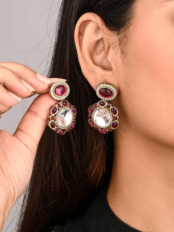 Statement_Earrings_Featuring_A_Bold_Circular_Design_With_A_Vintage_Finish