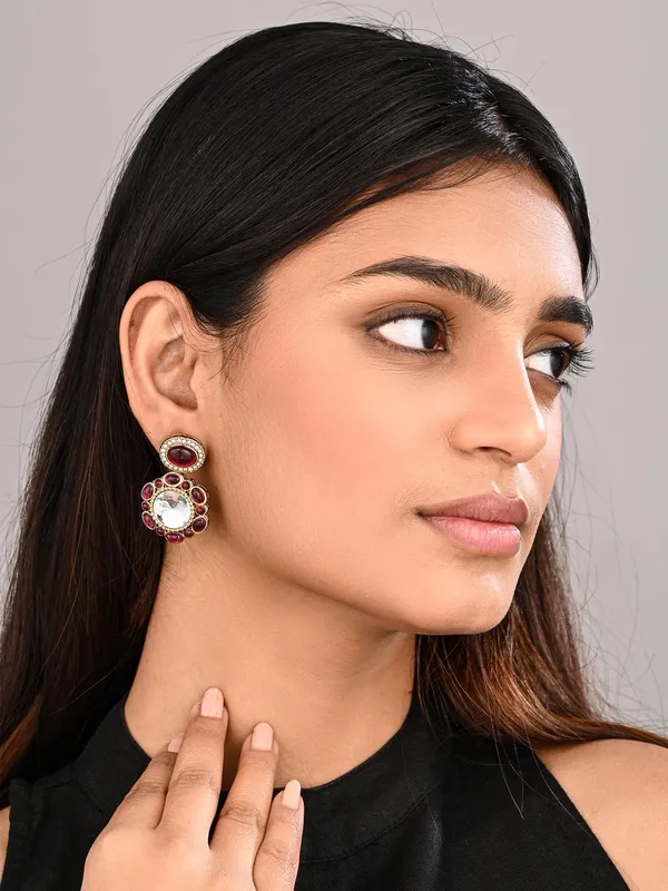 Statement_Earrings_Featuring_A_Bold_Circular_Design_With_A_Vintage_Finish