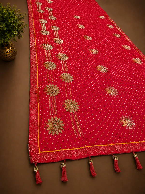 Pink_bandhani_saree_with_stone_amrodery_work_saree