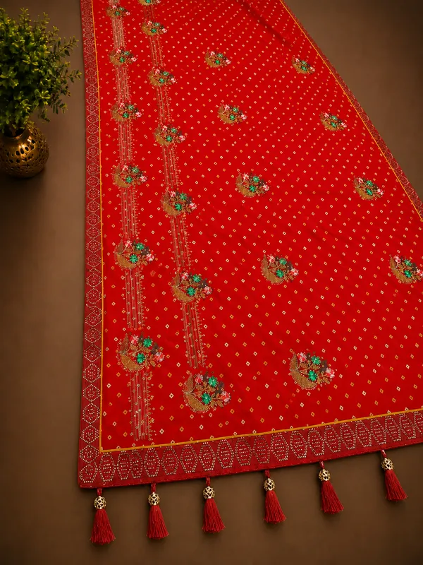 Red_bandhani_saree_with_stone_amrodery_work_saree