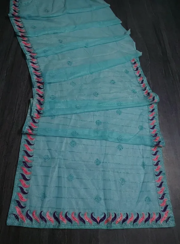 Sky_twill_Net_With_Handwork_Stone_And_Satari_work_saree