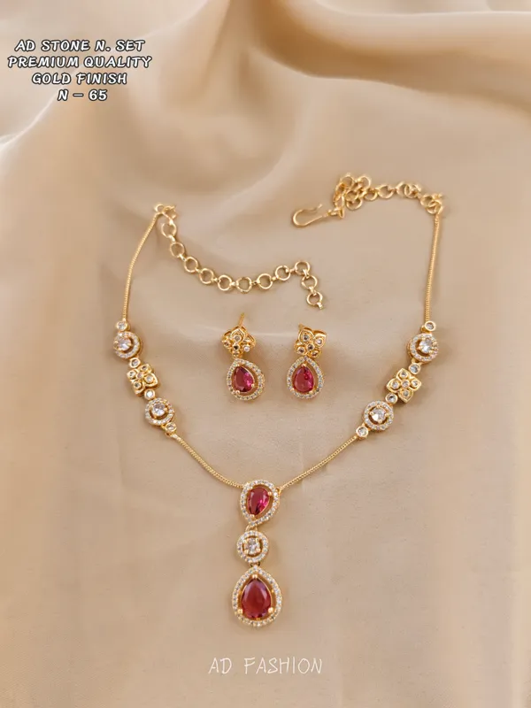 Gold_Finish_Brass_Red_Teardrop_Stone_Necklace_And_Earrings_Set_For_Women