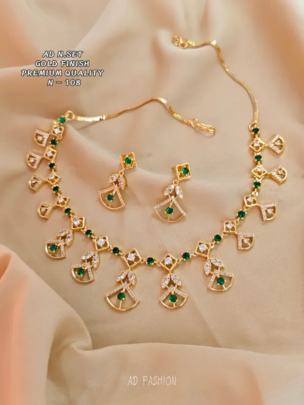 Gold_Finish_Green_Stone_Brass_Necklace_And_Earrings_Set_For_Women
