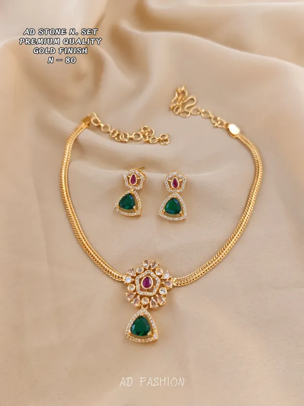 Gold_Finish_Brass_Red_Green_Ad_Stone_Necklace_And_Earrings_Set_For_Women