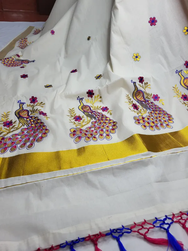 Sindhuja_Fashion_House_Embroidered,_Animal_Print_Kasavu_Pure_Cotton_Saree_(White,_Multicolor)