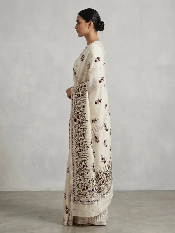 Sindhuja_Fashion_House_Embroidered,_Floral_Print_Daily_Wear_Tussar_Silk_Saree_(White)