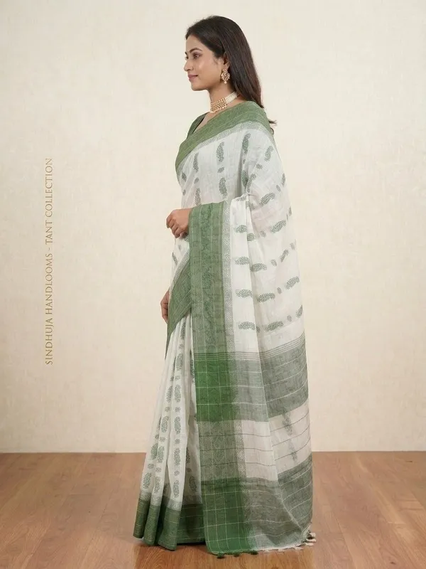 Sindhuja_Fashion_House_Striped,_Checkered,_Paisley,_Woven_Tant_Pure_Cotton_Saree_(Light_Green,_White)