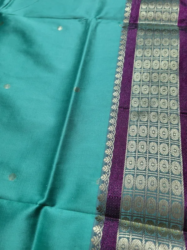 Sindhuja_Fashion_House_Woven_Banarasi_Pure_Silk,_Cotton_Silk_Saree_(Light_Green,_Purple)