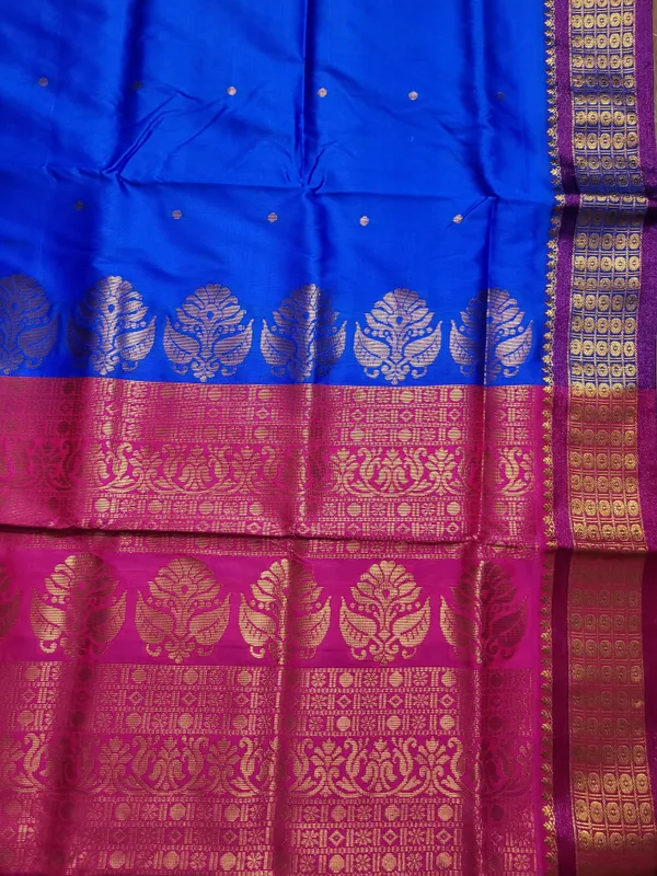 Sindhuja_Fashion_House_Woven_Banarasi_Pure_Silk,_Silk_Blend_Saree_(Blue,_Pink)
