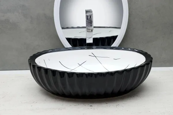HISRE_Designer_Fluted_Round_Black_&_White_Marble_Ceramic_Vessel_Sink_For_Bathroom_Wash_Basin_Over_Counter_(19_x_13.5_x_5.5_Inch)_(Style_-_2)_CE3303_Table_Top_Basin_(Black_&_White)