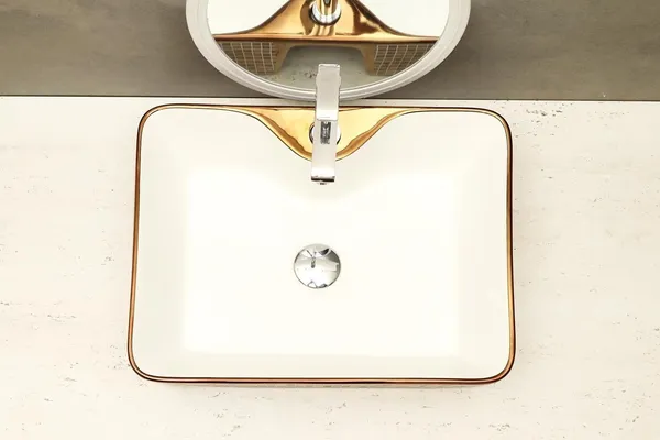 HISRE_Ceramic_Table_Top_Wash_Basin_|_Oval_Shape_Vessel_Sink_for_Bathroom_Over_Counter_Wash_Basin_For_Bathrooms_&_Living_Room_19_X_14_X_5_Inch_(G1104)_Table_Top_Basin_(Gold_&_White)