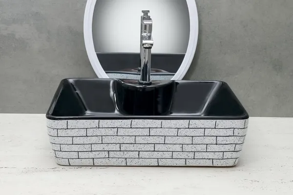 HISRE_Ceramic_Table_Top_Vessel_Sink_Wash_Basin_Oval_Shape_Over_Counter_Wash_Basin_For_Bathrooms_&_Living_Room_19_X_14_X_5_Inch_(RT602)_Table_Top_Basin_(Black_&_Gray)