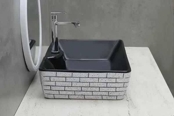 HISRE_Ceramic_Table_Top_Vessel_Sink_Wash_Basin_Oval_Shape_Over_Counter_Wash_Basin_For_Bathrooms_&_Living_Room_19_X_14_X_5_Inch_(RT602)_Table_Top_Basin_(Black_&_Gray)