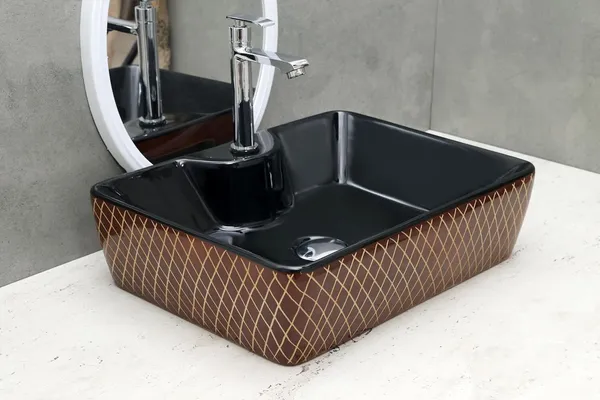 HISRE_Ceramic_Table_Top_Vessel_Sink_Wash_Basin_Oval_Shape_Over_Counter_Wash_Basin_For_Bathrooms_&_Living_Room_19_X_14_X_5_Inch_(RT604)_Table_Top_Basin_(Black)