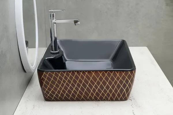 HISRE_Ceramic_Table_Top_Vessel_Sink_Wash_Basin_Oval_Shape_Over_Counter_Wash_Basin_For_Bathrooms_&_Living_Room_19_X_14_X_5_Inch_(RT604)_Table_Top_Basin_(Black)