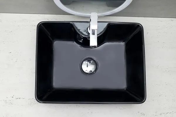 HISRE_Ceramic_Table_Top_Vessel_Sink_Wash_Basin_Oval_Shape_Over_Counter_Wash_Basin_For_Bathrooms_&_Living_Room_19_X_14_X_5_Inch_(RT604)_Table_Top_Basin_(Black)