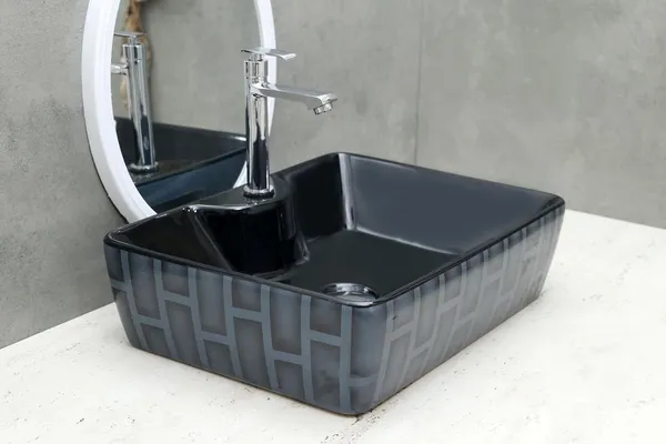 HISRE_Ceramic_Table_Top_Vessel_Sink_Wash_Basin_Oval_Shape_Over_Counter_Wash_Basin_For_Bathrooms_&_Living_Room_19_X_14_X_5_Inch_(RT606)_Table_Top_Basin_(Black)