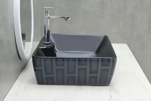 HISRE_Ceramic_Table_Top_Vessel_Sink_Wash_Basin_Oval_Shape_Over_Counter_Wash_Basin_For_Bathrooms_&_Living_Room_19_X_14_X_5_Inch_(RT606)_Table_Top_Basin_(Black)