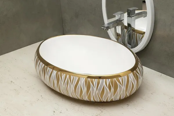 HISRE_Designer_Ceramic_Table_Top_Sink_Basin_for_Bathroom_Tabletop_Marble_Basin_for_Living_Room(Golden_Veins,27x_17_x_5.5_Inch)_Over_Counter_Basin_(White_&Golden_Design)