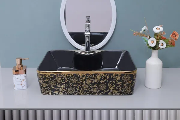 HISRE_Luxury_Ceramic_Wash_Basin_Black_Gold_Glossy_Rectangle_Designer_Countertop_Sink_European_Style_Designer_Countertop_Vessel_Sink_for_Bathroom_(19x_14_x_5_Inch)_Over_Counter_Basin_(Black_&_Golden)