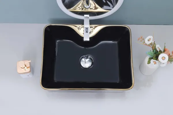 HISRE_Luxury_Ceramic_Wash_Basin_Black_Gold_Glossy_Rectangle_Designer_Countertop_Sink_European_Style_Designer_Countertop_Vessel_Sink_for_Bathroom_(19x_14_x_5_Inch)_Over_Counter_Basin_(Black_&_Golden)