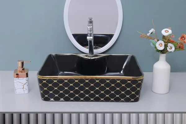 HISRE_Luxury_Ceramic_Tabletop_Wash_Basin_Black_Gold_Glossy_Rectangle_Bathroom_Sink_European_Style_Designer_Countertop_Vessel_Sink_for_Bathroom_(19x14x5_Inch)_G1112_Over_Counter_Basin_(Black_&_Golden)