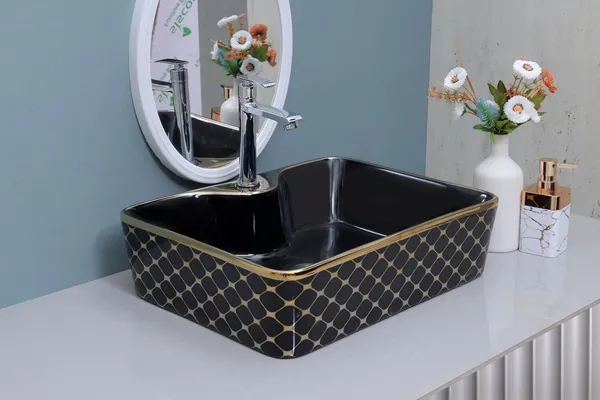 HISRE_Luxury_Ceramic_Tabletop_Wash_Basin_Black_Gold_Glossy_Rectangle_Bathroom_Sink_European_Style_Designer_Countertop_Vessel_Sink_for_Bathroom_(19x14x5_Inch)_G1112_Over_Counter_Basin_(Black_&_Golden)