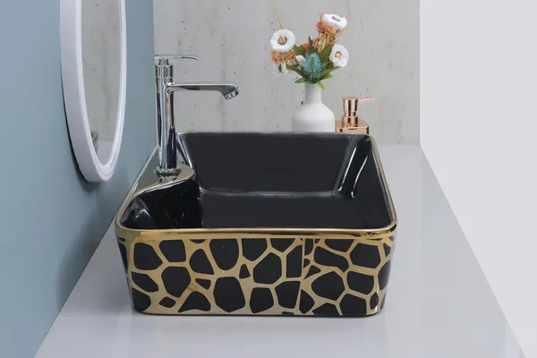 HISRE_Luxury_Glossy_Ceramic_Tabletop_Wash_Basin_Black_Gold_Glossy_Square_Designer_Sink_European_Style_Designer_Countertop_Vessel_Sink_for_Bathroom_(19x14x5_Inch)_G1113_Over_Counter_Basin_(Black_&_Golden)