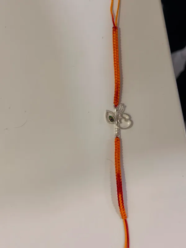 Orange_Thread_Charm_Rakhi_for_Unisex