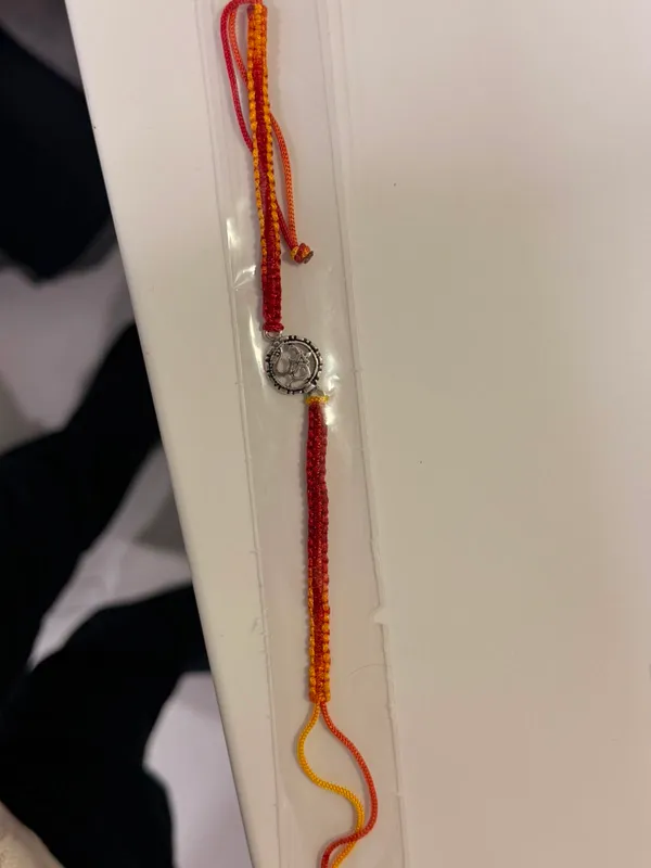 Red_And_Yellow_Braided_Thread_Rakhi