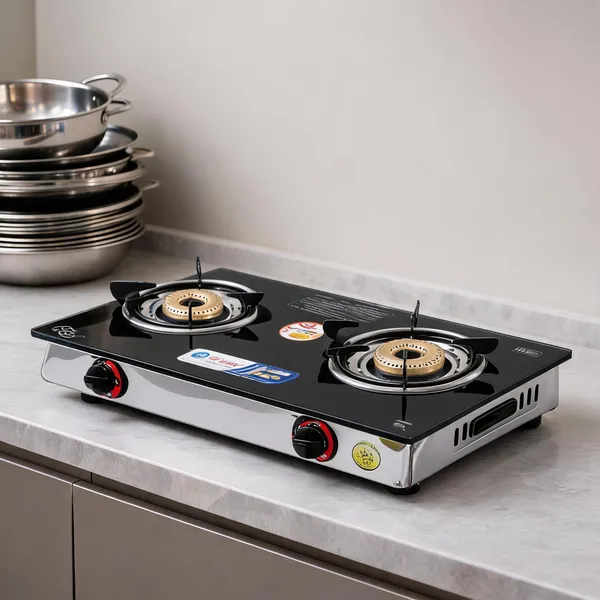 Shiv_Surya_Cute_2_Burner_Gas_Stove_With_Toughened_Glass_|_Tri-Pin_Brass_Burners_|_Manual_Ignition_|_Heavy-Duty_Ss_Frame_|_Compact_Nano_Design_|_Isi_Certified_|