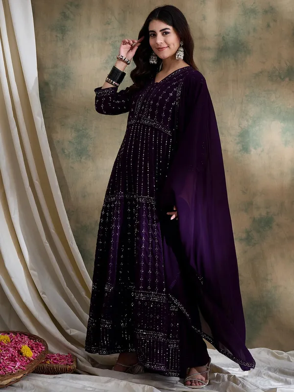 Elegant_Embroidered_Anarkali_Gown_With_V_Neck_And_Lace_Dupatta
