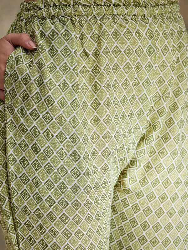 Printed_Straight_Kurta_With_Bottom_Notch_Neck,_3/4_Sleeve_Stitched_Cotton_Set