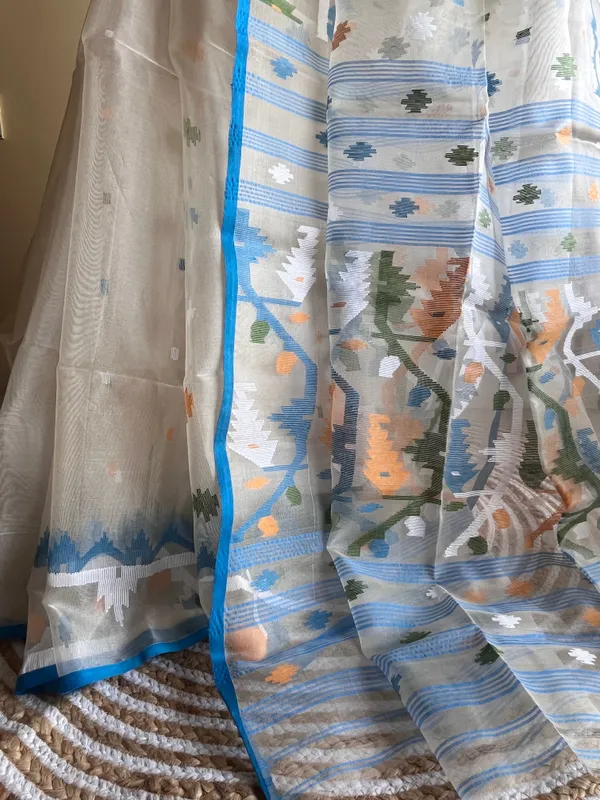 White_Pure_Muslin_Silk_Jamdani_Saree_–_Blue_Hand_Needlework