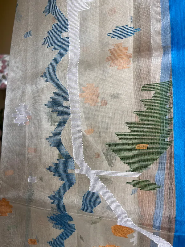 White_Pure_Muslin_Silk_Jamdani_Saree_–_Blue_Hand_Needlework