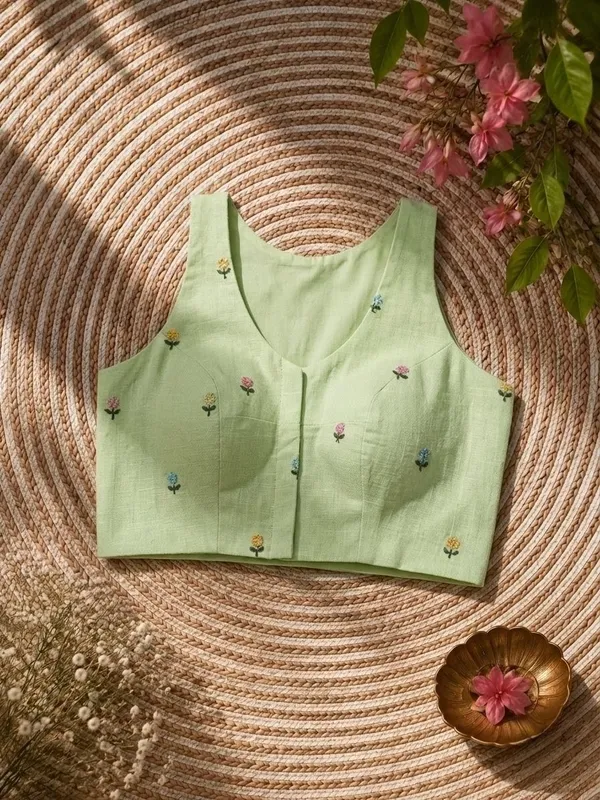 Green_Saree_with_Cotton_Sleeveless_Floral_Embroidered_Blouse_for_Women