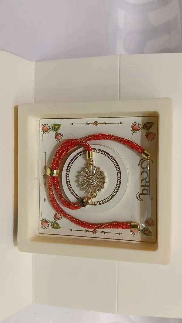 Red_Thread_Floral_Rakhi_For_Brother