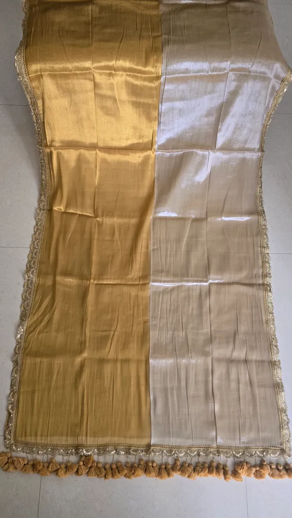 Raga_Gold_Color_With_Gold_Lace_And_Big_Tassels_Mul_Tissue_Saree