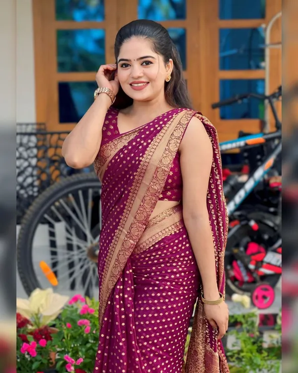 Maroon_Printed_Saree_With_Gold_Border_for_Women