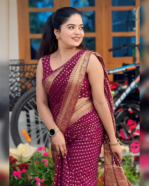 Maroon_Printed_Saree_With_Gold_Border_for_Women