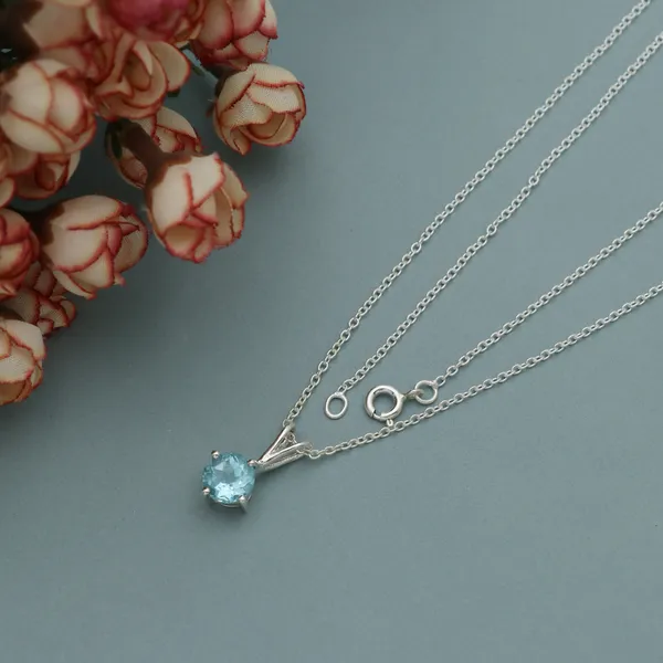 925_sterling_silver_pendant_with_Blue_topaz